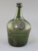 A 'Pyrmont Water' sealed bottle, c.1720-40 of mallet shape, with inverted seal to the shoulder,