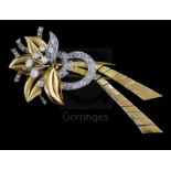 A mid 20th century French 18ct gold and diamond set stylised flower head clip brooch, with two