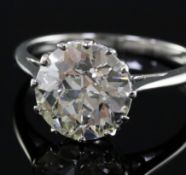 A platinum and solitaire diamond ring, the round cut stone weighing 4.40cts, with a colour and