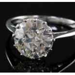 A platinum and solitaire diamond ring, the round cut stone weighing 4.40cts, with a colour and