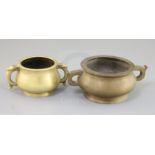 Two Chinese bronze gui censers, both with a pair of looped handles, four character seal marks, W.