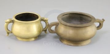 Two Chinese bronze gui censers, both with a pair of looped handles, four character seal marks, W.