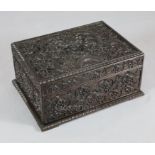 A Chinese hongmu casket, late 19th/early 20th century, carved in high relief with dragons amid