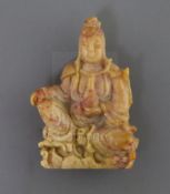 A Chinese soapstone figure of Guanyin, early 20th century, seated holding a vase, with peach