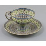 An early 20th century Norwegian silver, enamel and plique a jour cup and saucer, by Marius Hammer,