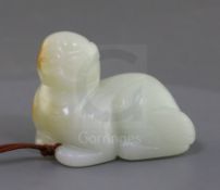 A Chinese white jade figure of a recumbent lion-dog, possibly 18th century, The stone of good even