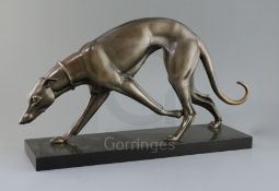 Attributed to Irene Rochard. An Art Deco bronze model of a greyhound, on black marble plinth, length