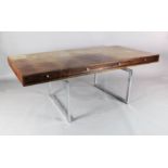 A Bodil Kjær rosewood freestanding 'working table' desk with underframe of chromed steel fitted four