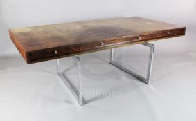 A Bodil Kjær rosewood freestanding 'working table' desk with underframe of chromed steel fitted four