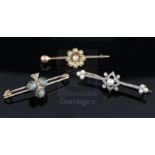 Three assorted Victorian gold and gem set bar brooches, one modelled as clover set with cat's eye