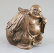 A Japanese Bizen ware figure of Hotei, Meiji period, with pierced bag to his back for burning