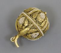 A 19th century French? silver filligree and seed pearl set pomander, with fruiting vine