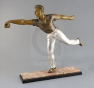 A French Art Deco patinated spelter figure of a boules player, on two colour marble plinth, height