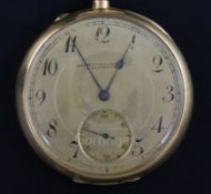 An engine turned 14ct gold International Watch Co. open face keyless pocket watch, with Arabic