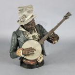 A Goldscheider cold painted terracotta bust of a banjo player, 30in.