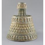 A 13th century Khorassan silver and copper inlaid bronze candlestick, of octagonal faceted truncated