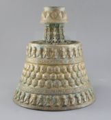 A 13th century Khorassan silver and copper inlaid bronze candlestick, of octagonal faceted truncated