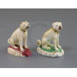 Two Rockingham porcelain figures of seated pug dogs, c.1830, one seated on a maroon base, the