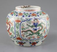 A Chinese wucai 'dragon' jar, Qing dynasty, painted four reserves of confronting dragons, within
