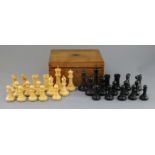 A Jaques & Son Ltd Staunton chess set, in ebony and boxwood, kings 4.5in., in original baize lined