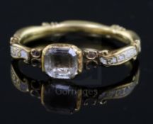 A George II gold, white enamel and rock crystal set mourning ring, with hair beneath the central