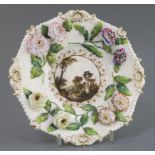 A rare Rockingham porcelain octagonal cabinet plate, c.1830-42, the centred finely painted with a