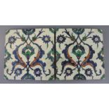 A pair 17th century Ottoman polychrome glazed fritware tiles, decorated in red, blue and green