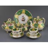 A Rockingham neo-rococo teaset, c.1830-5, each piece painted with a floral bouquet, with gilt