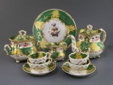 A Rockingham neo-rococo teaset, c.1830-5, each piece painted with a floral bouquet, with gilt