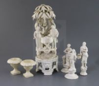 A group of Italian creamware, Naples, 19th century, including an arbour group of a lady and