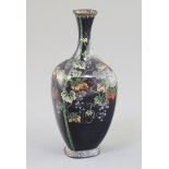 A Japanese silver wire cloisonne enamel vase, Meiji period, decorated with a bamboo trellis trailing