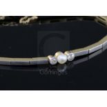 A mid 20th century 14ct gold, diamond and cultured pearl three stone set bracelet,