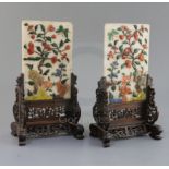 A pair of Chinese hardstone and coral table screens with hongmu stands, early 20th century, the