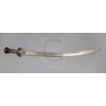An Indian steel handled tulwar, with engraved and stamped blade, the hilt decorated with stylised
