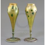 A pair of Tiffany gold favrile glass vases, c.1915, of tulip form, each decorated with a green