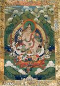 A thangka depicting Padmasambhava in the form of Nyima Ozer, Tibet, 19th century the central
