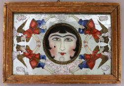 A 19th century Qajar painted and reverse painted mirror, with central face motif flanked by four