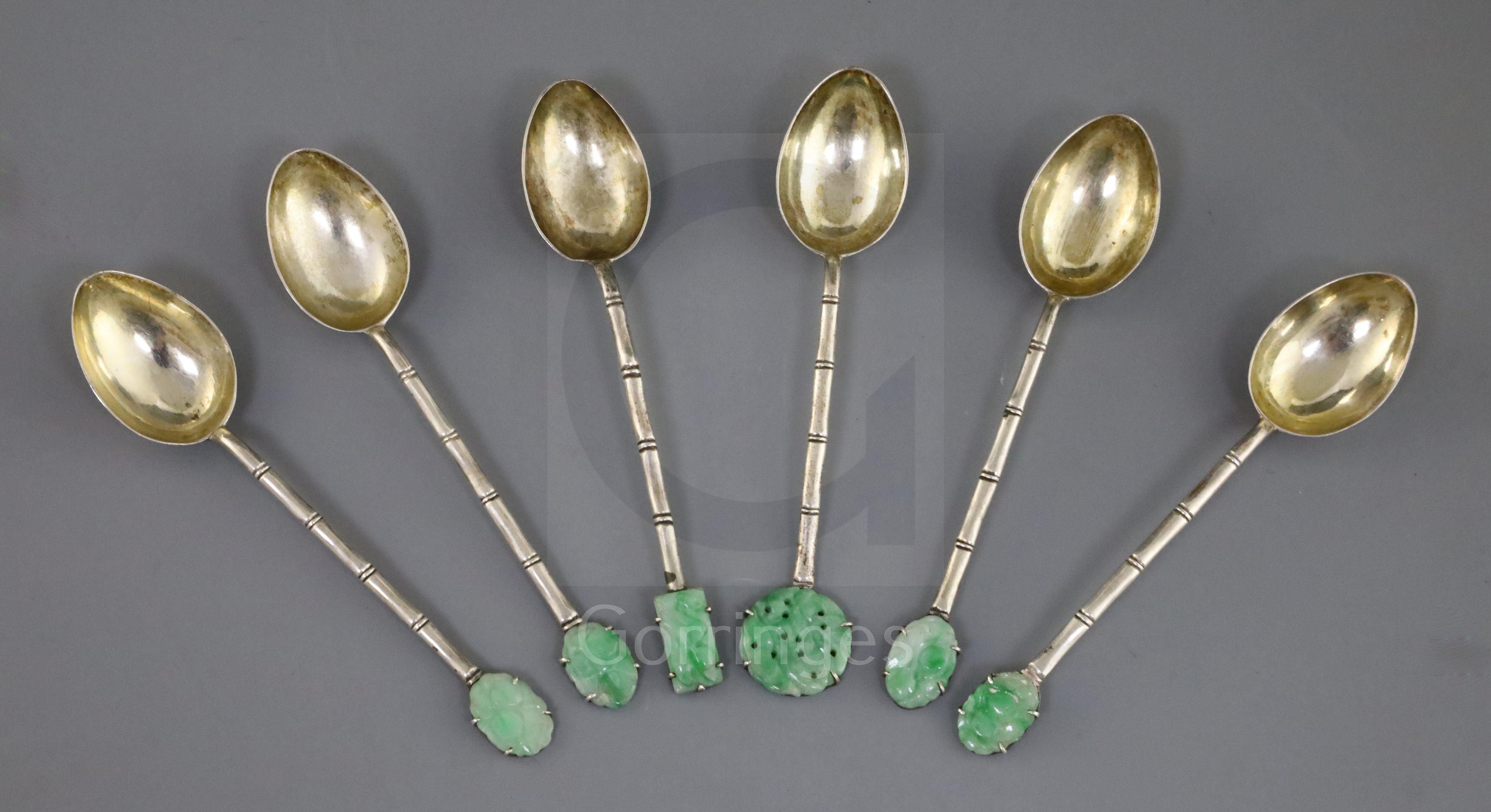 Six Chinese export silver and jadeite mounted teaspoons, early 20th century, the terminals mounted