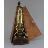 An early 19th century English brass Culpepper-type microscope, the mahogany base with single