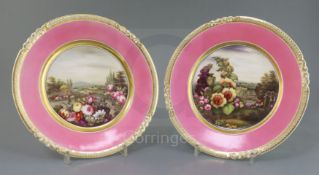 A rare pair of Rockingham porcelain cabinet plates, c.1826-30, painted by George Speight with an