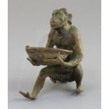 A late 19th century Franz Bergman cold painted bronze model of a monkey holding a walnut shell,