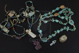 A group of Egyptian jewellery and relics, including two bead necklaces