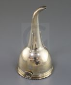A George III silver wine funnel by William Burwash, with engraved crest, London, 1819, 14.2cm.