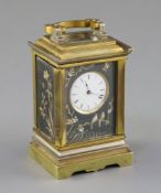 An early 20th century French gilt brass and Komai style miniature carriage timepiece, decorated in