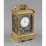 An early 20th century French gilt brass and Komai style miniature carriage timepiece, decorated in