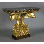 A Regency style giltwood and mahogany console table, with green marble top and twin dolphin