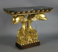 A Regency style giltwood and mahogany console table, with green marble top and twin dolphin