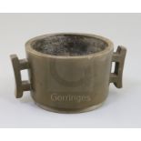 A Chinese bronze censer, of tapering cylindrical form, applied with a pair of trellis shaped
