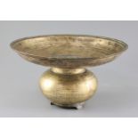 A 17th century Indian bronze spittoon, with bulbous base and three feet, diameter 13in. height 7.