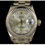 A lady's 1980's 18ct gold and diamond Rolex Oyster Perpetual Datejust wrist watch, with diamond